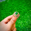 Gold plated ring with green stone
