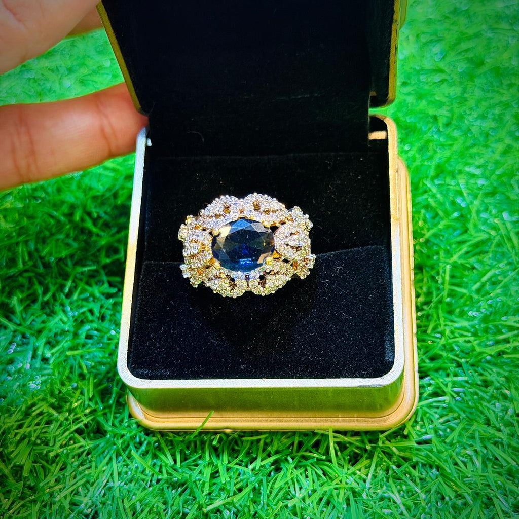 Gold plated ring with navy stone