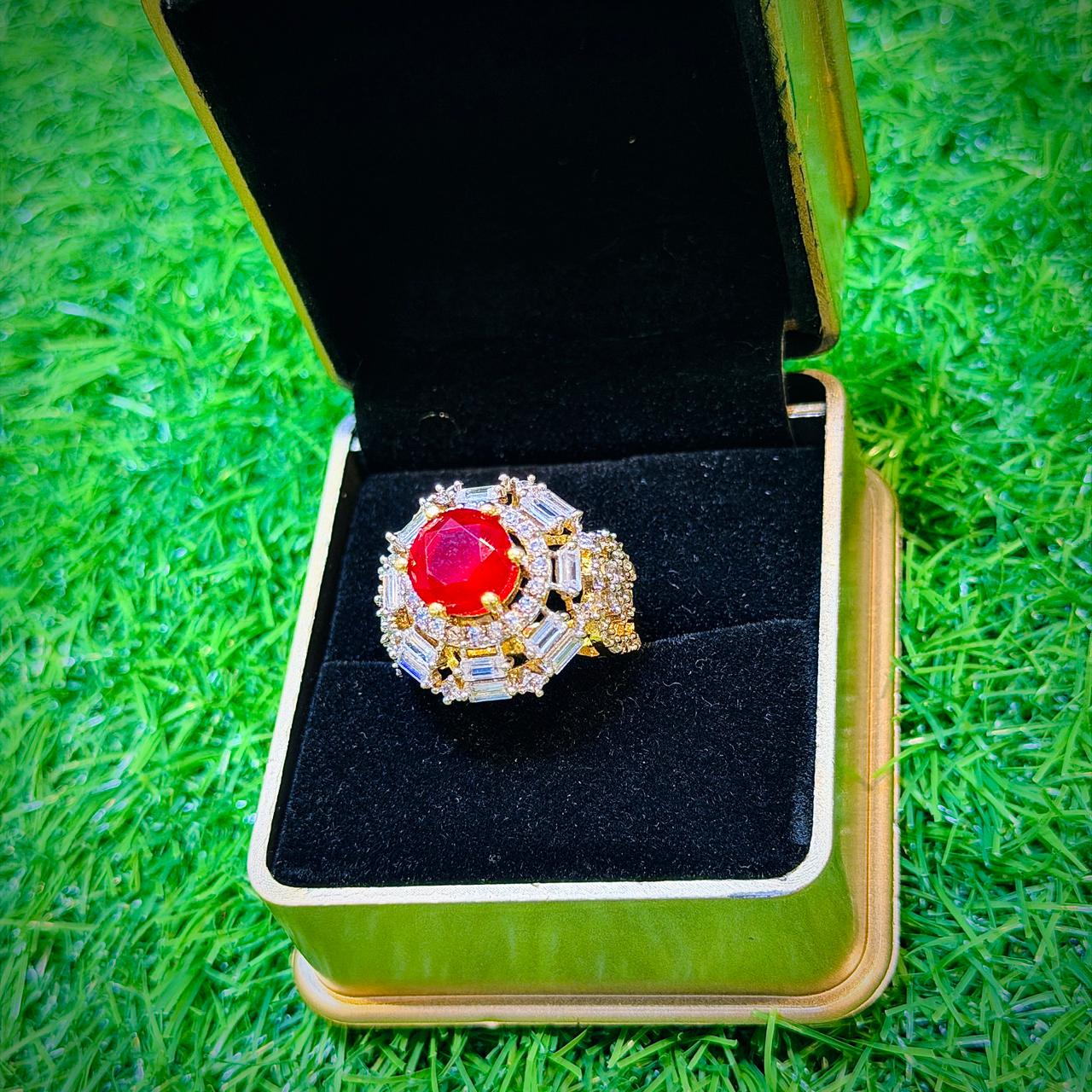 Gold plated ring with red stone