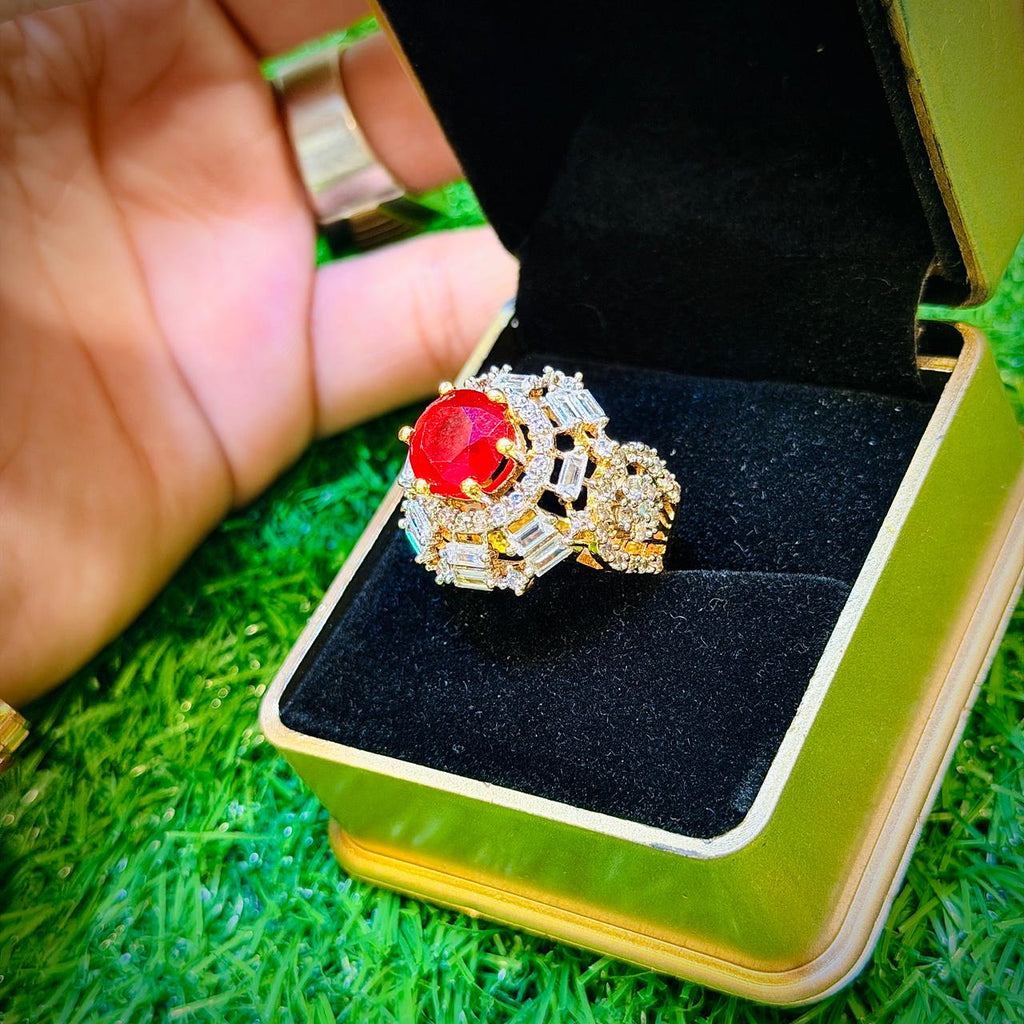 Gold plated ring with red stone