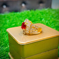 Gold plated ring with red stone