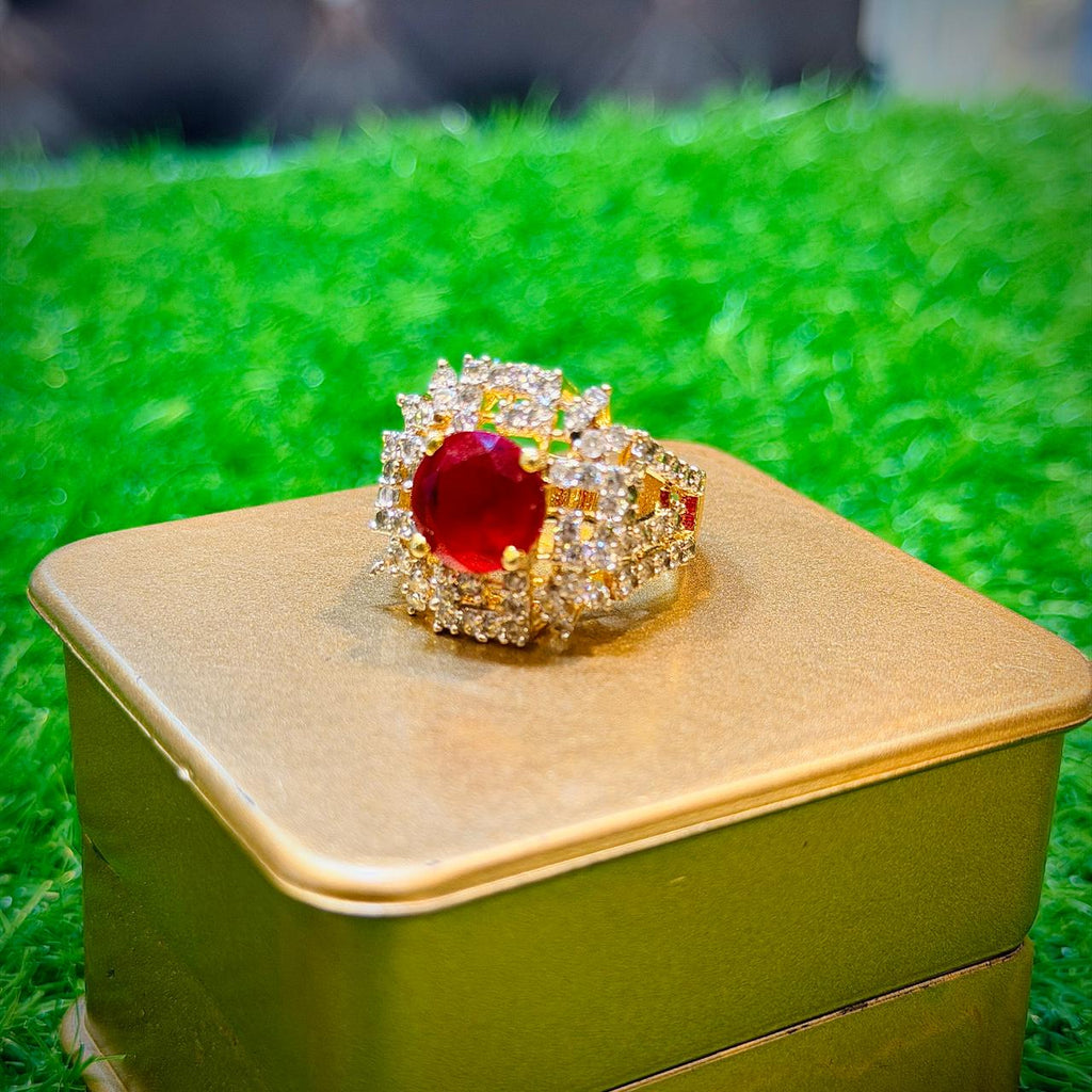 Gold plated ring with red stone