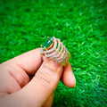 Gold and silver plated ring with emerald green stone