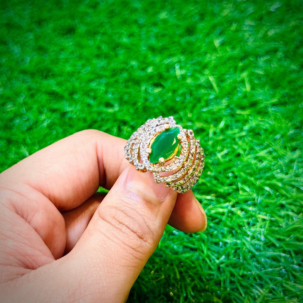 Gold and silver plated ring with emerald green stone