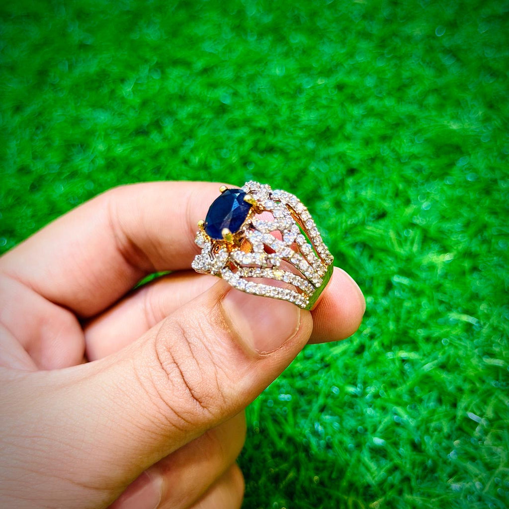 Gold plated ring with dark blue stone, unique design