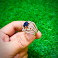 Gold plated ring with dark blue stone, unique design