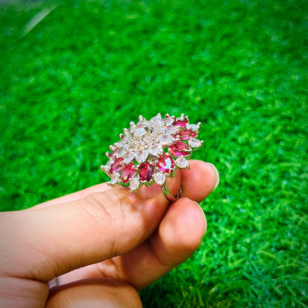 Gold plated ring with flower design & shocking pink stone
