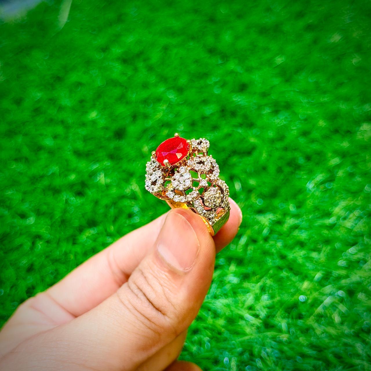 Gold plated ring with red stone