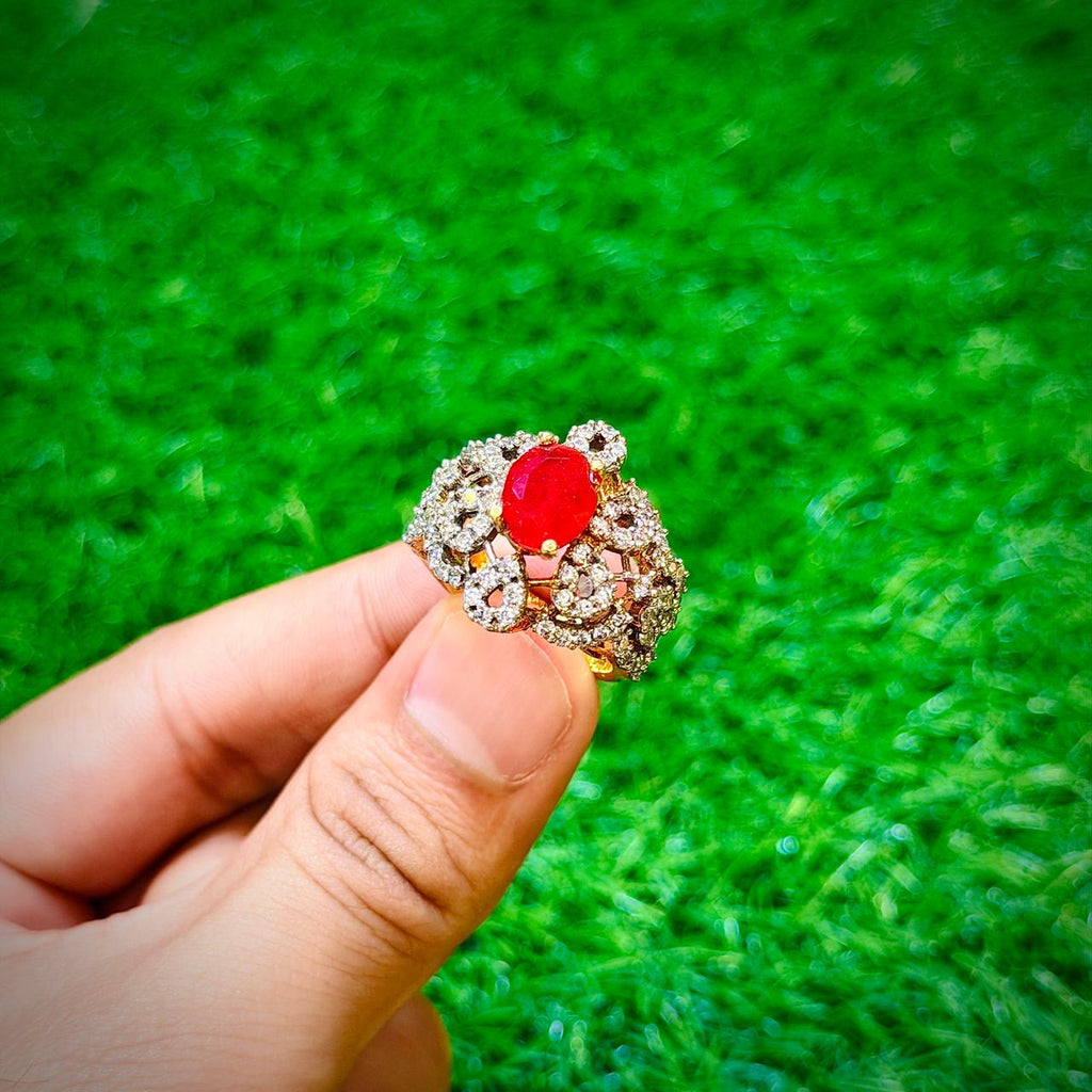 Gold plated ring with red stone