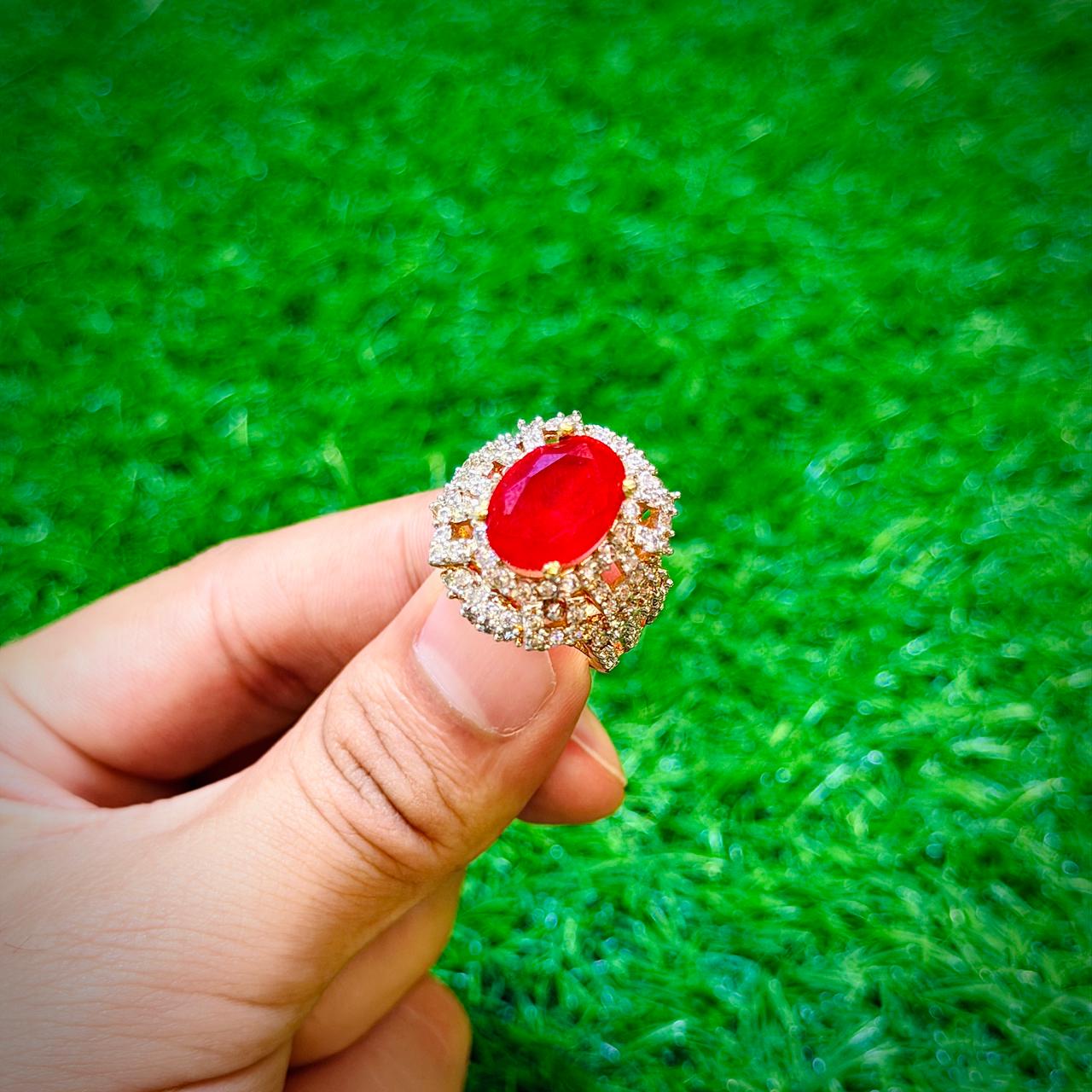 Gold plated ring with ruby red stone