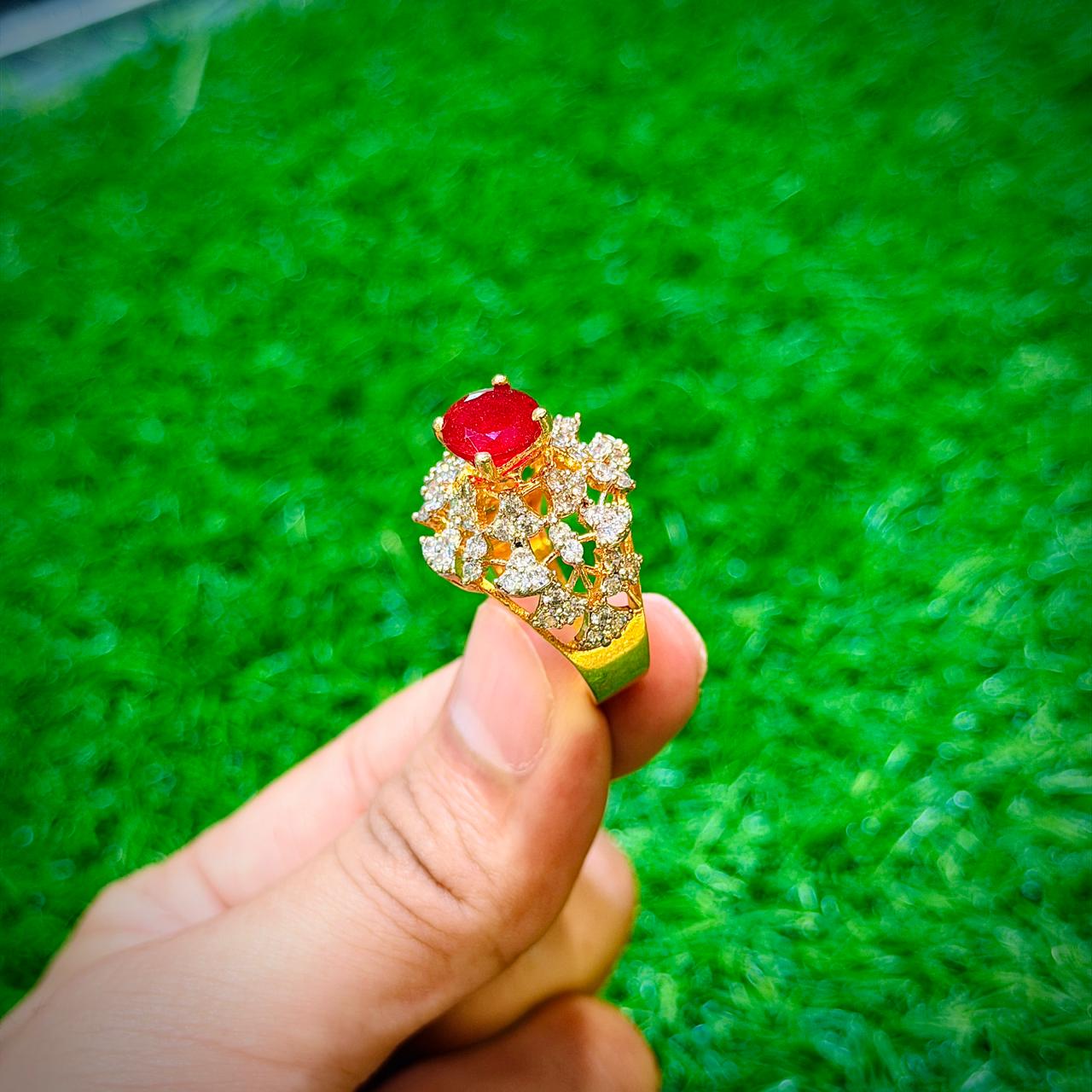 Gold plated ring with ruby red stone