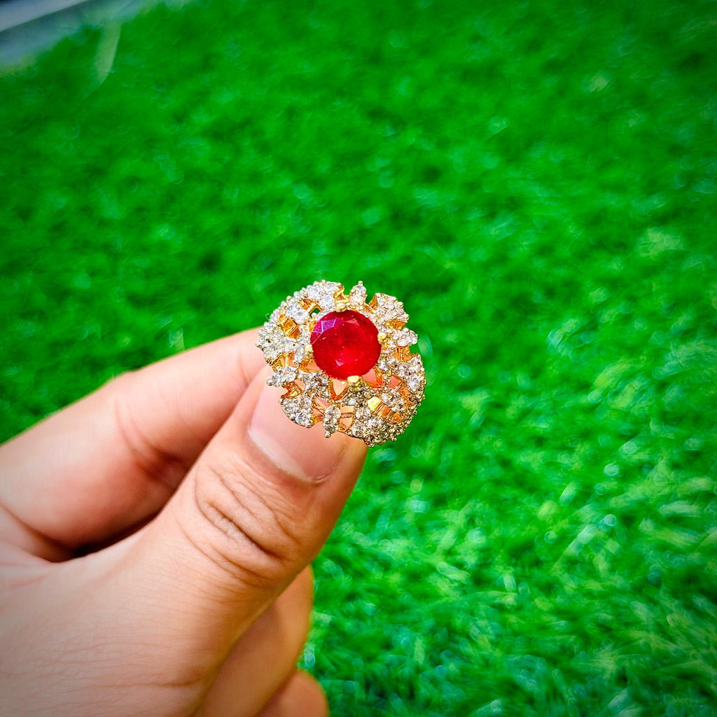 Gold plated ring with ruby red stone