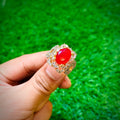 Gold plated ring with ruby red stone