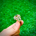 Gold plated ring with small emerald green stone